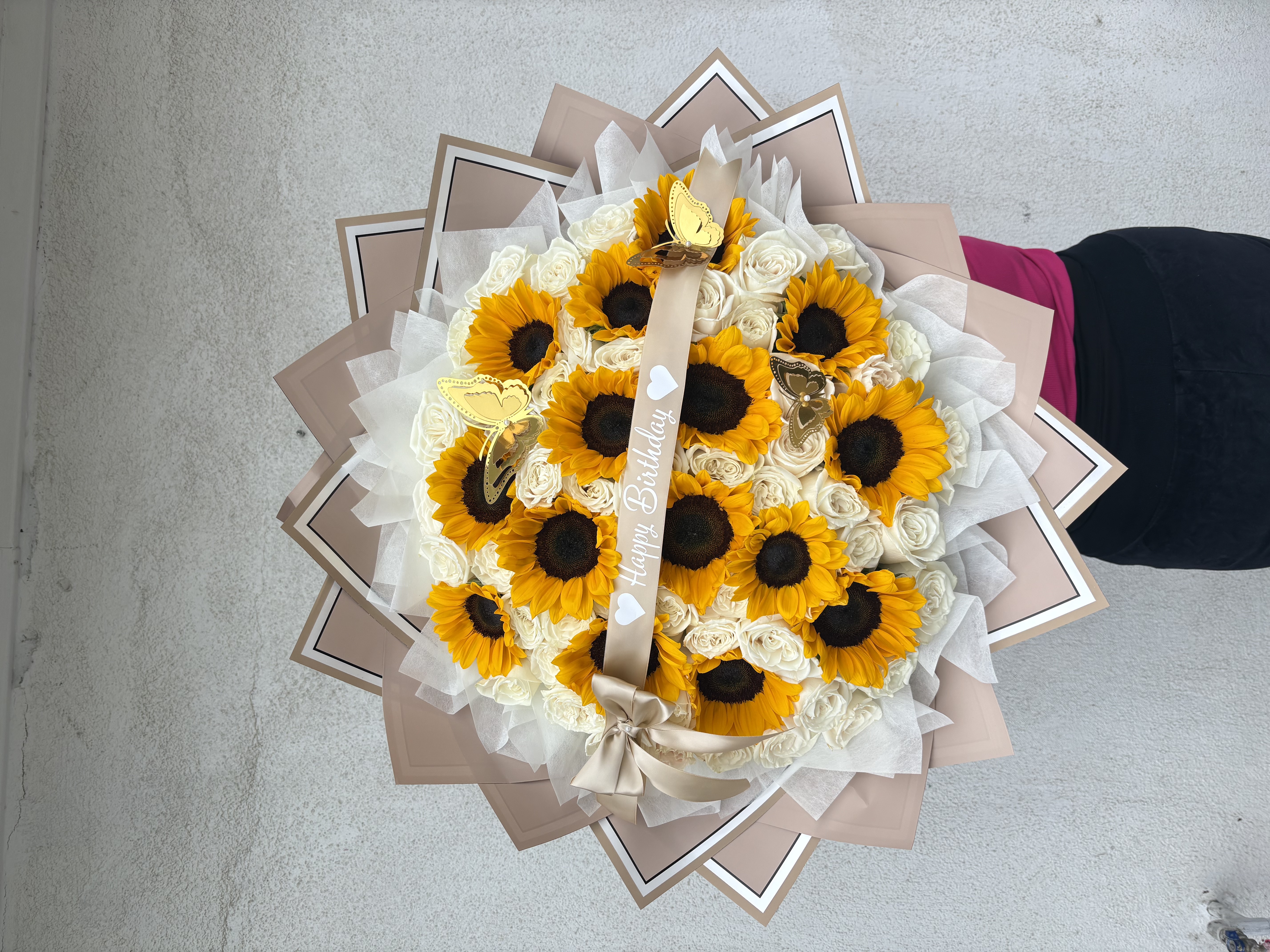 100 White Rose Bouquet – 100 White Rose Bouquet with 15 Sunflowers 
Custom Ribbon Lights
3 Butterflies