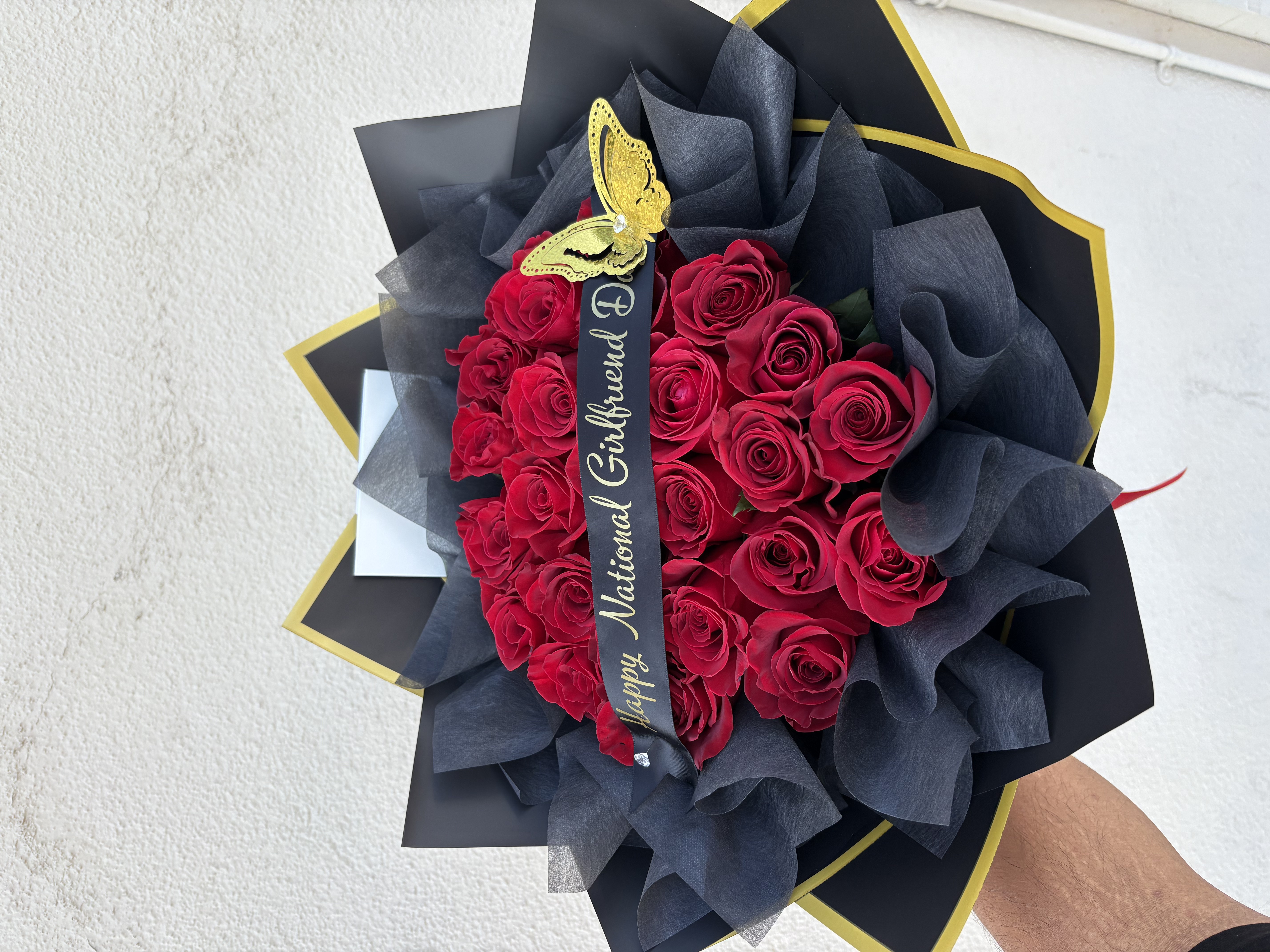 25 Red Rose Bouquet w/ Accessories – 1 Butterfly
1 Custom Ribbon